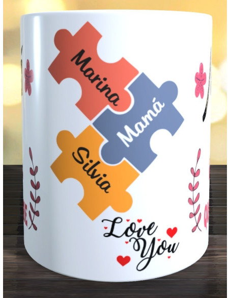 Taza  MAMÁ ERES LA PIEZA QUE NOS UNE